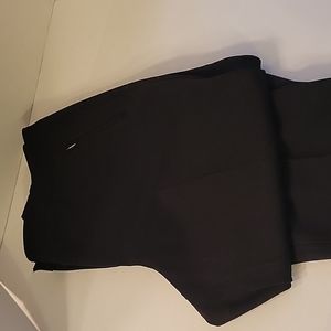 Dress Pants Petite black, two zipper pockets on each side.